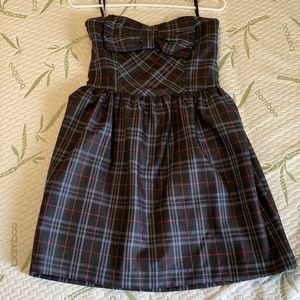 Strapless plaid babydoll type dress with bow detail on bodice, never worn, nwot